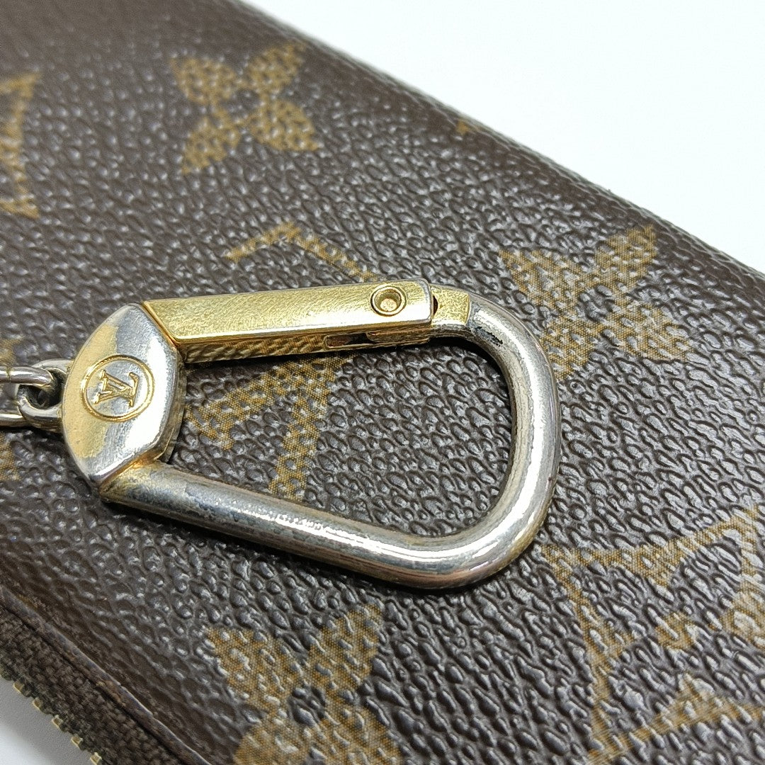 Monogram Coated Canvas Clutch Brown