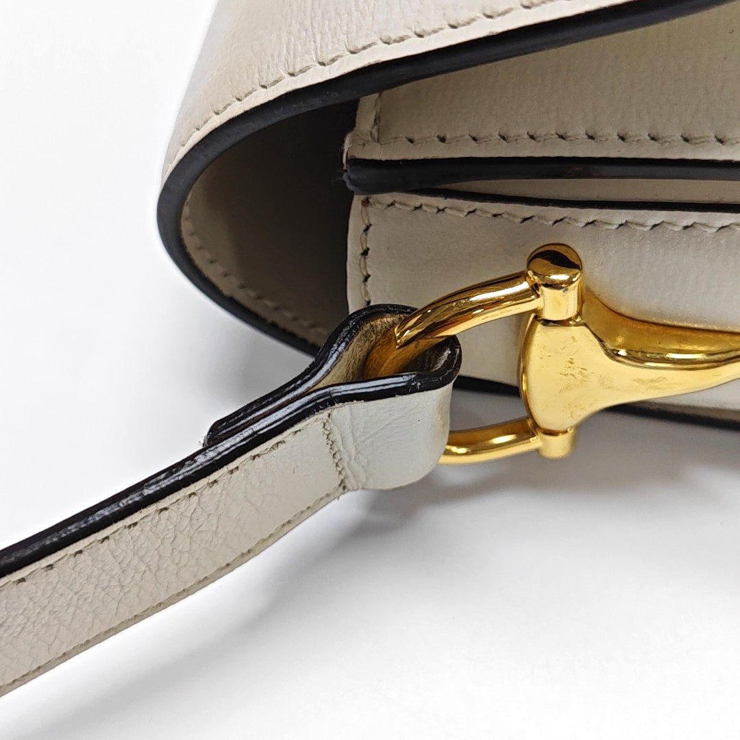 Authenticated pre-owned  Horsebit 1955 Small Calfskin White - Shoulder Bag at Looply