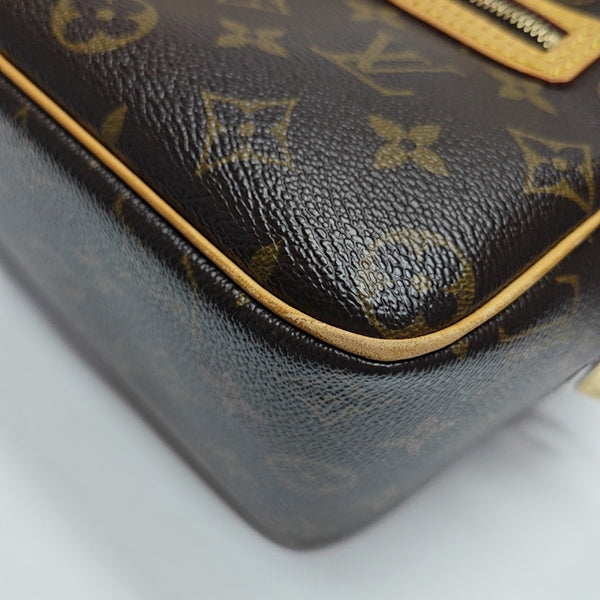 CITE MM Monogram Coated Canvas Brown