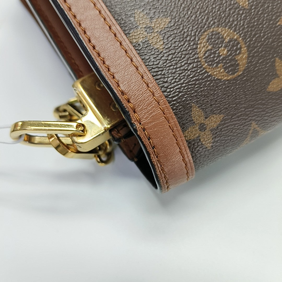 DAUPHINE MM Monogram Coated Canvas Brown