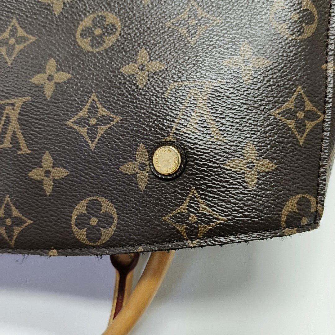MONTAIGNE Monogram Coated Canvas Brown