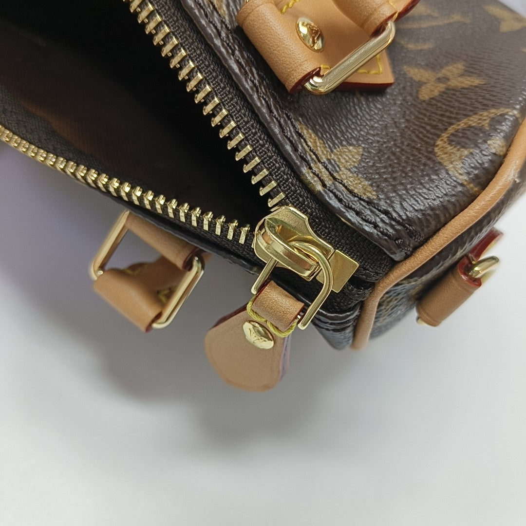 Authenticated pre-owned  SPEEDY Nano Monogram Coated Canvas Brown - Shoulder Bag at Looply