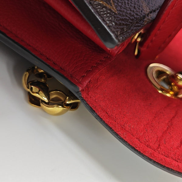VICTOIRE Monogram Coated Canvas Brown