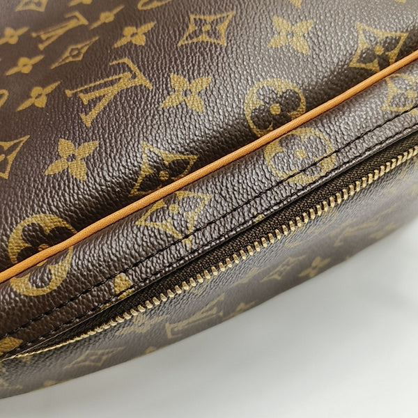EXCURSION Monogram Coated Canvas Brown