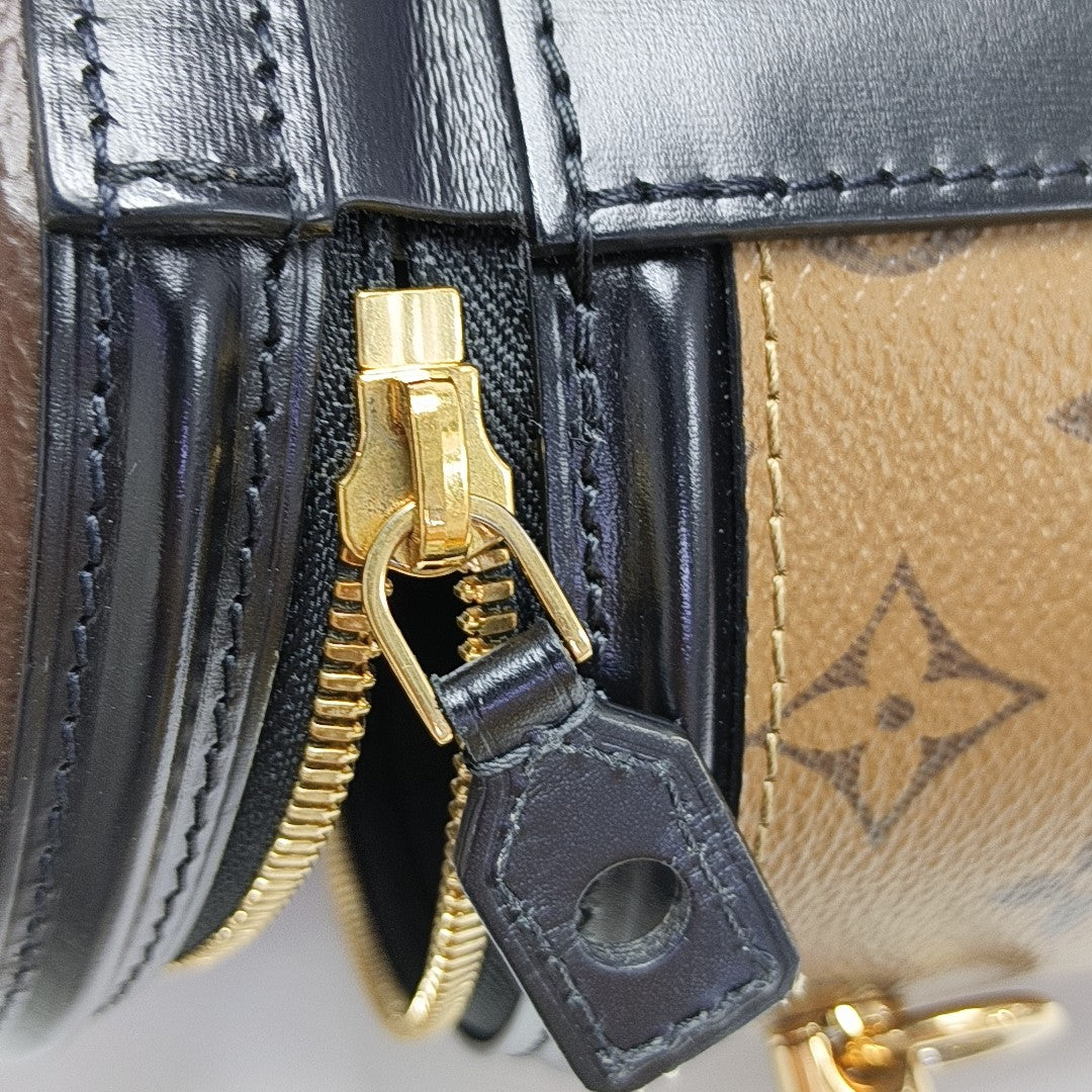 CANNES PM Monogram Coated Canvas Brown