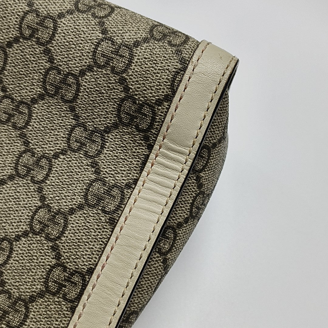 Padlock Small Monogram Coated Canvas Beige