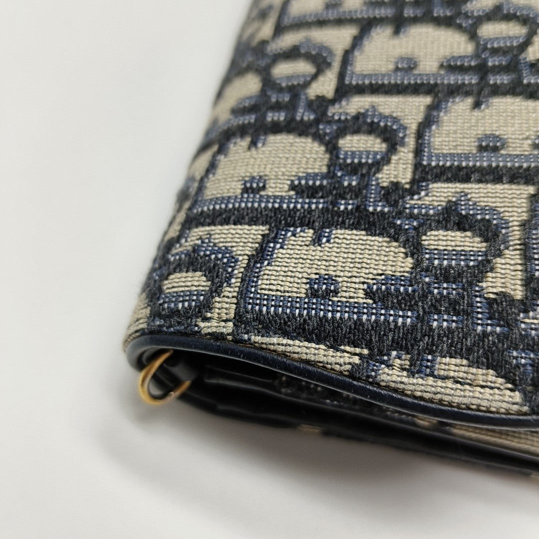 Authenticated pre-owned  Saddle Small Oblique Canvas Blue - Crossbody Bag at Looply