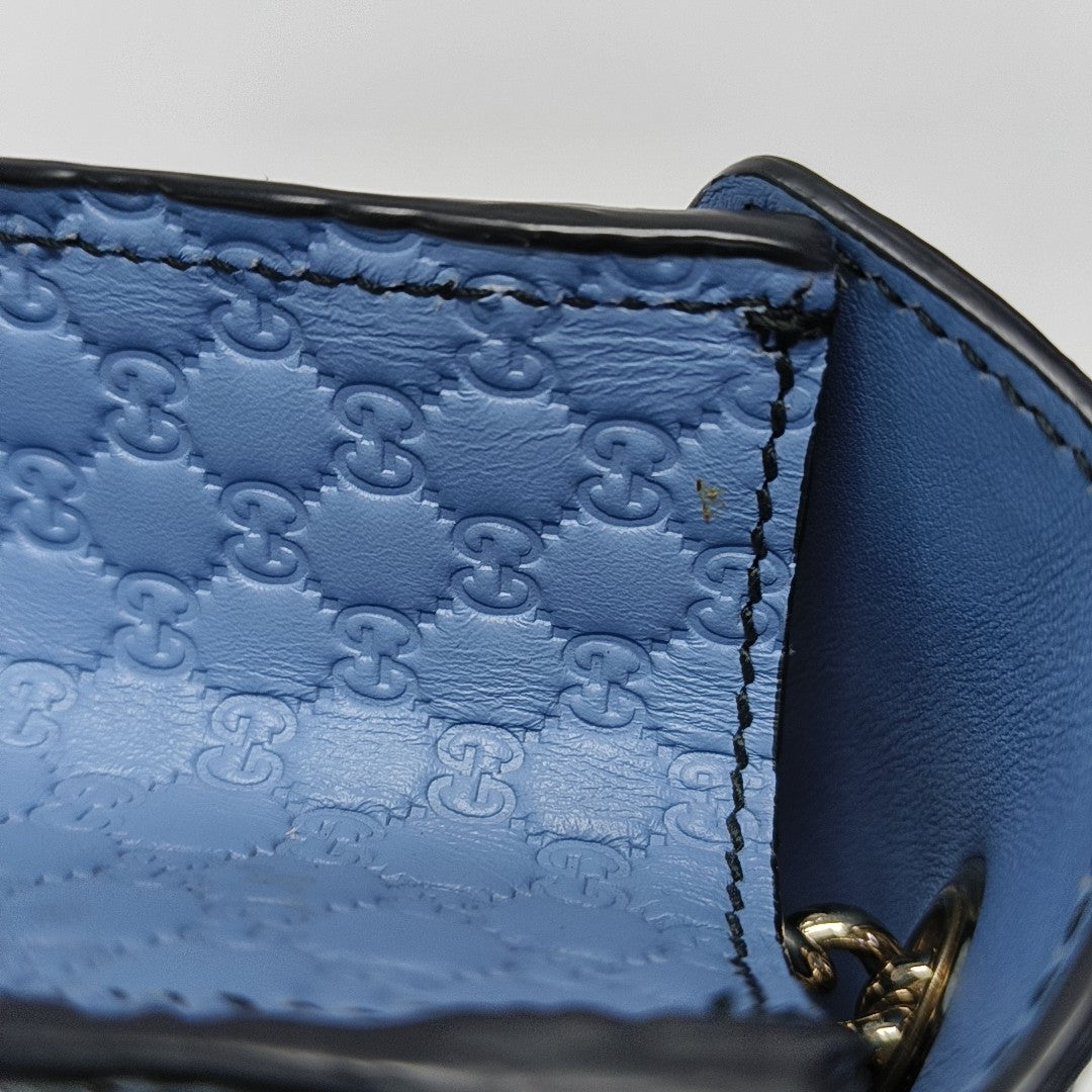 Emily Chain Mini Monogram Calfskin Blue