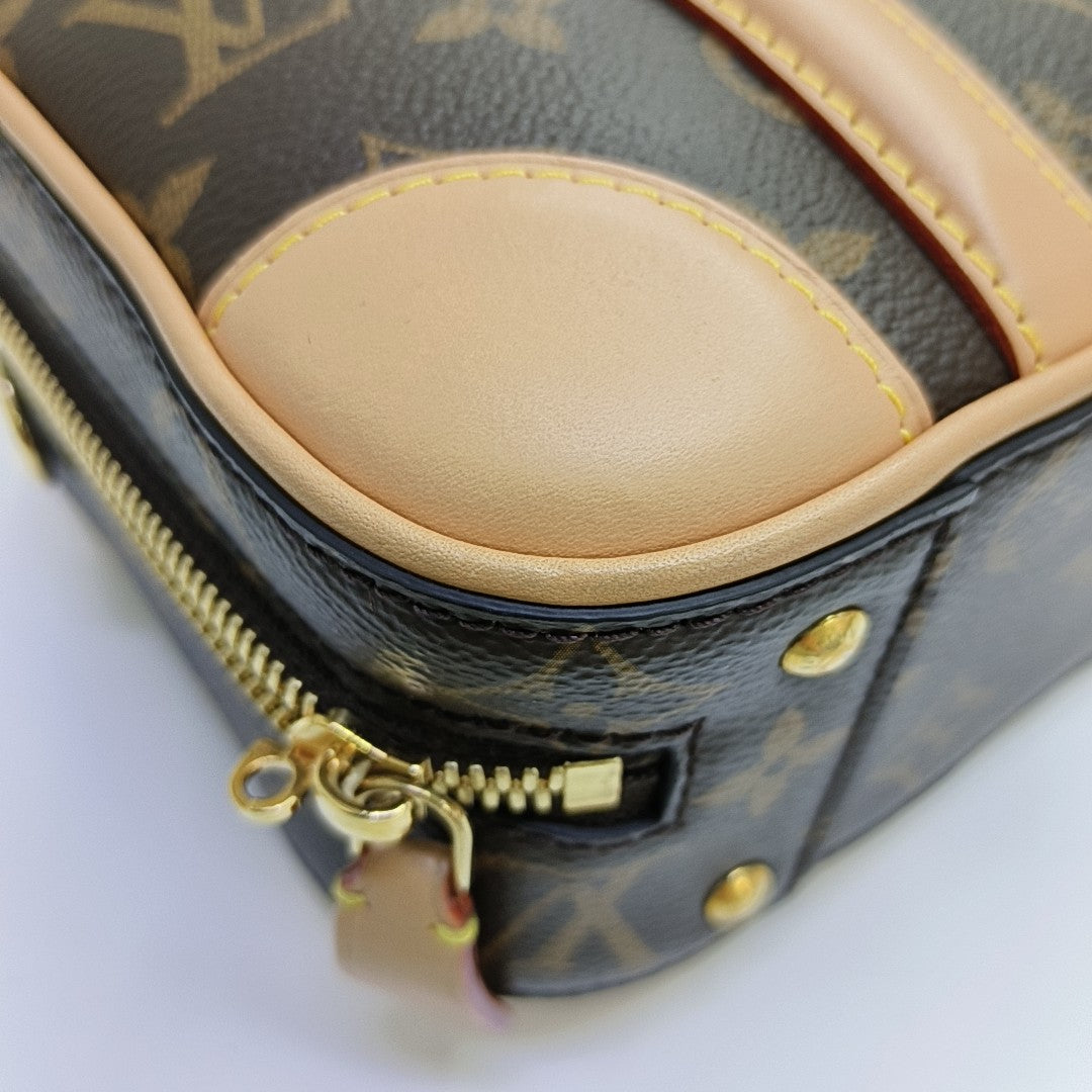 LUGGAGE Monogram Coated Canvas Brown