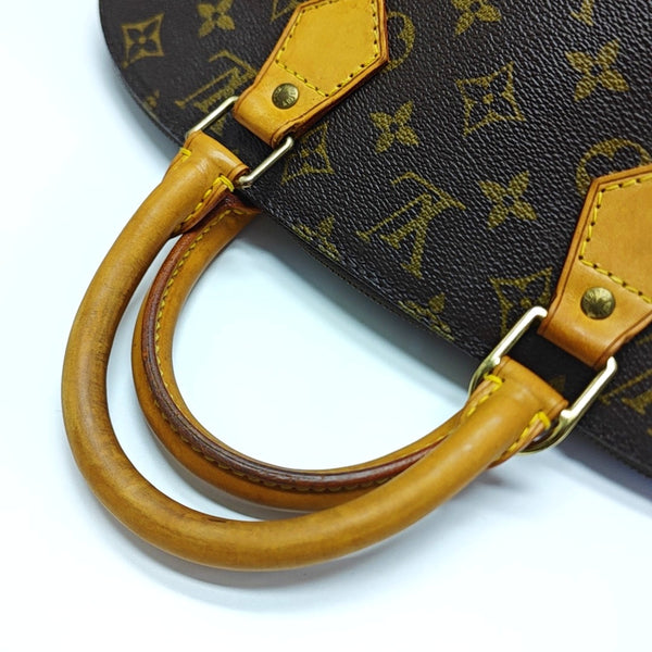 ALMA PM Monogram Coated Canvas Brown