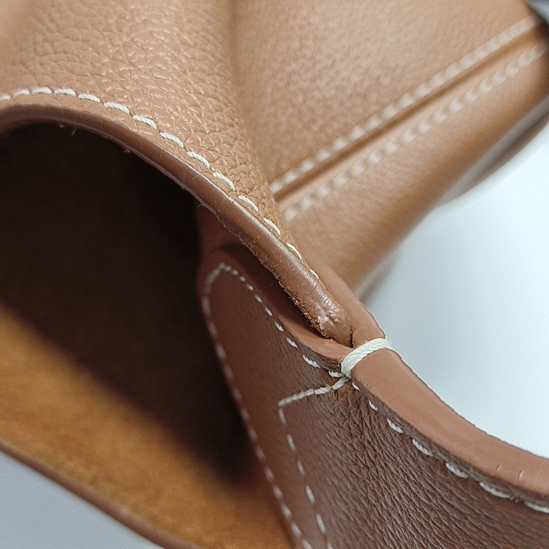 LOW KEY HOBO PM Monogram Calfskin Brown