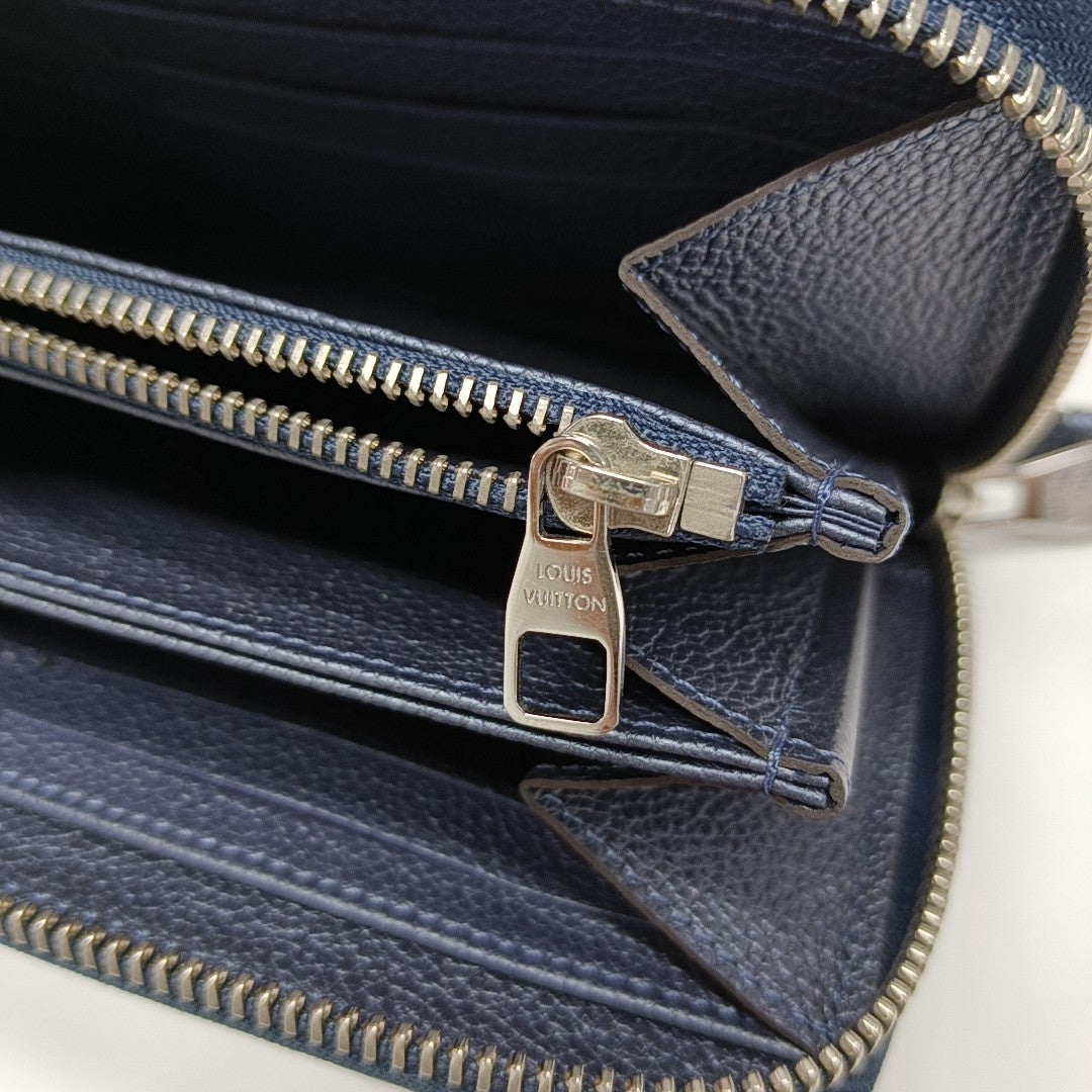 ZIPPY Monogram Calfskin Blue Wallet