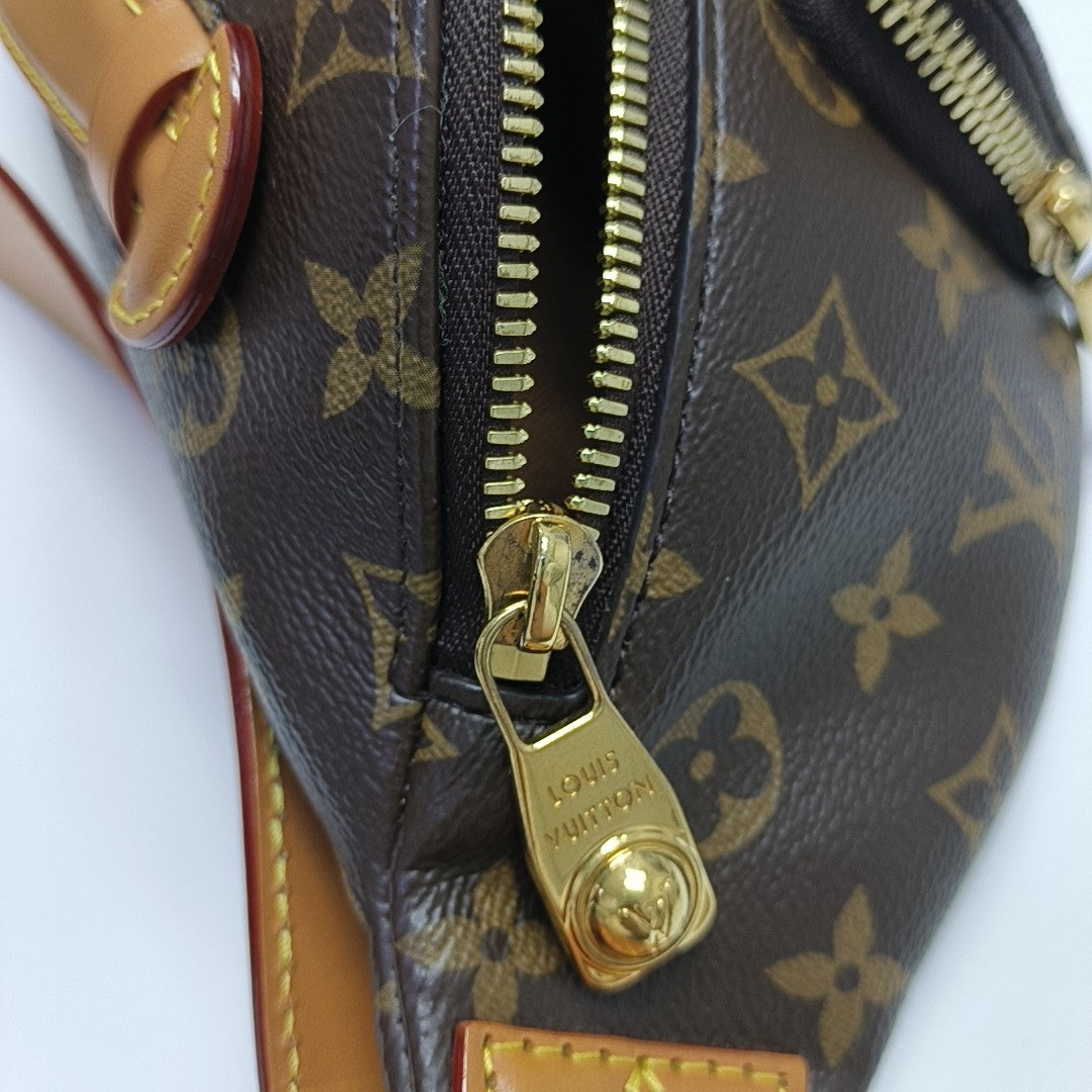 RUSH Monogram Coated Canvas Brown