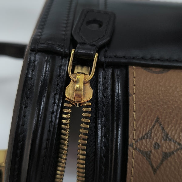 CANNES PM Monogram Coated Canvas Brown