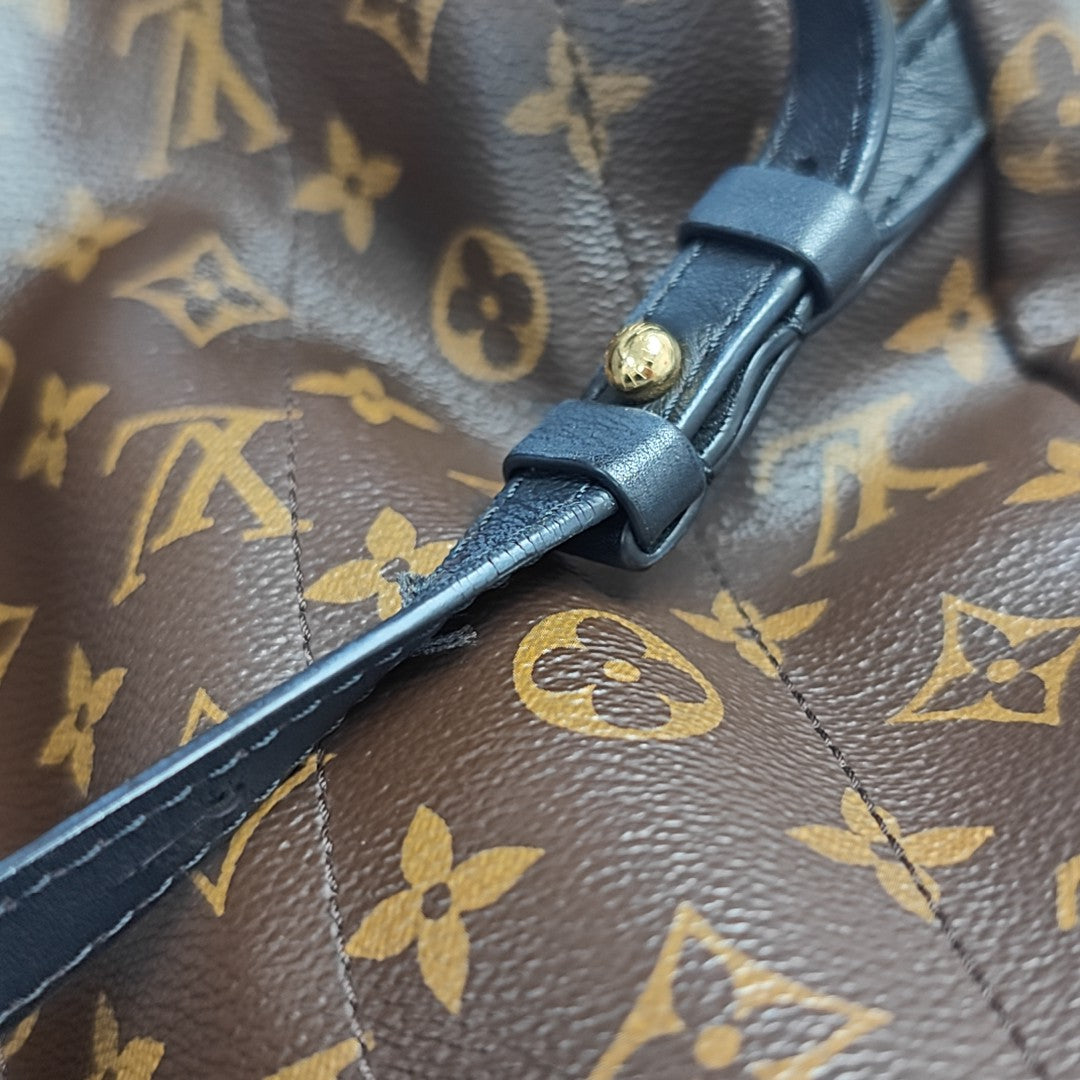 Monogram Coated Canvas Backpack Brown