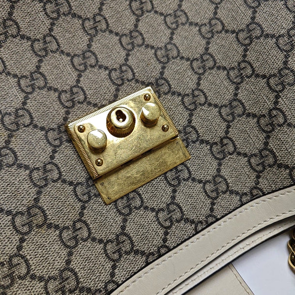 Authenticated pre-owned  Padlock Medium Monogram Coated Canvas Beige - Shoulder Bag at Looply