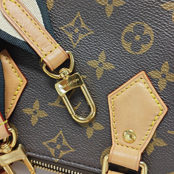 SPEEDY 20 Monogram Coated Canvas Brown