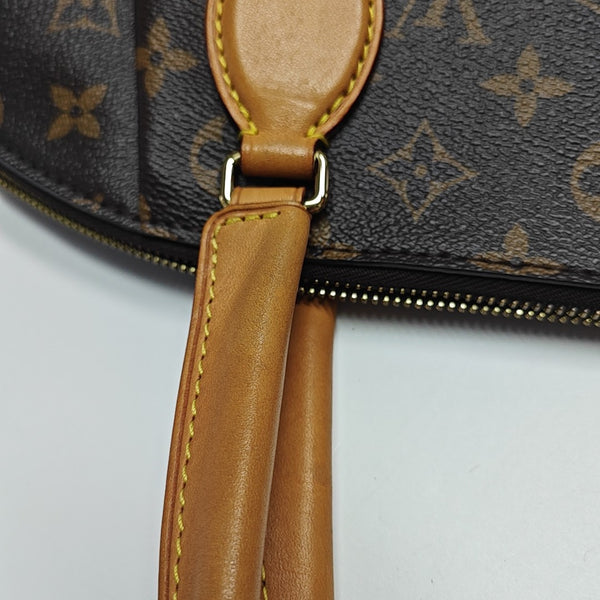 RIVOLI MM Monogram Coated Canvas Brown