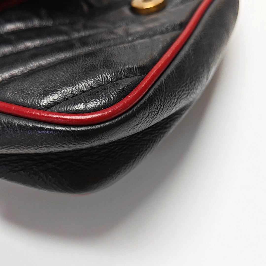 Authenticated pre-owned  GG Marmont Super Mini Quilted Calfskin Black - Crossbody Bag at Looply