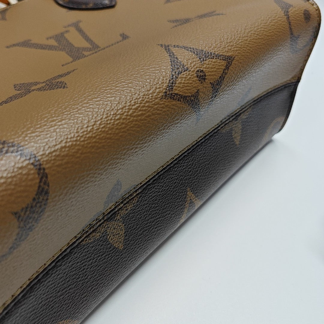 ONTHEGO PM Monogram Coated Canvas Brown