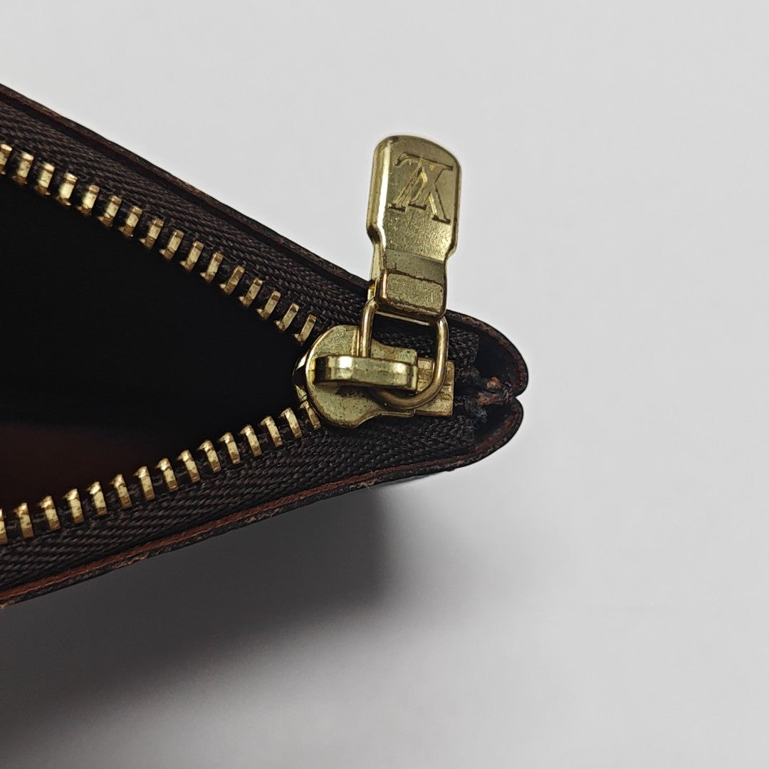 Monogram Coated Canvas Clutch Brown