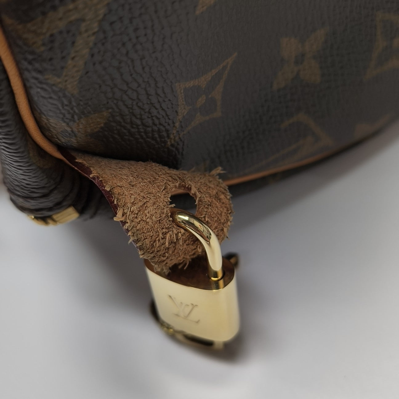 SPEEDY 30 Monogram Coated Canvas Brown