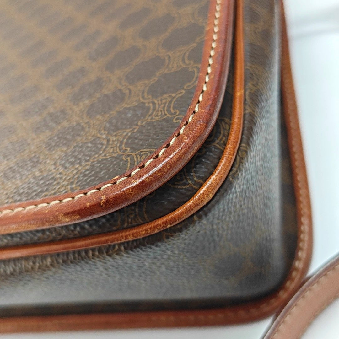 Authenticated pre-owned  MACADAM BLASON TRIOMPHE Coated Canvas Brown - Shoulder Bag at Looply