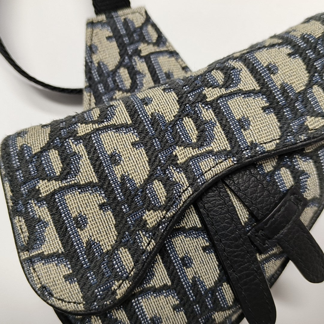 Authenticated pre-owned  Saddle Oblique Canvas Beige - Shoulder Bag at Looply