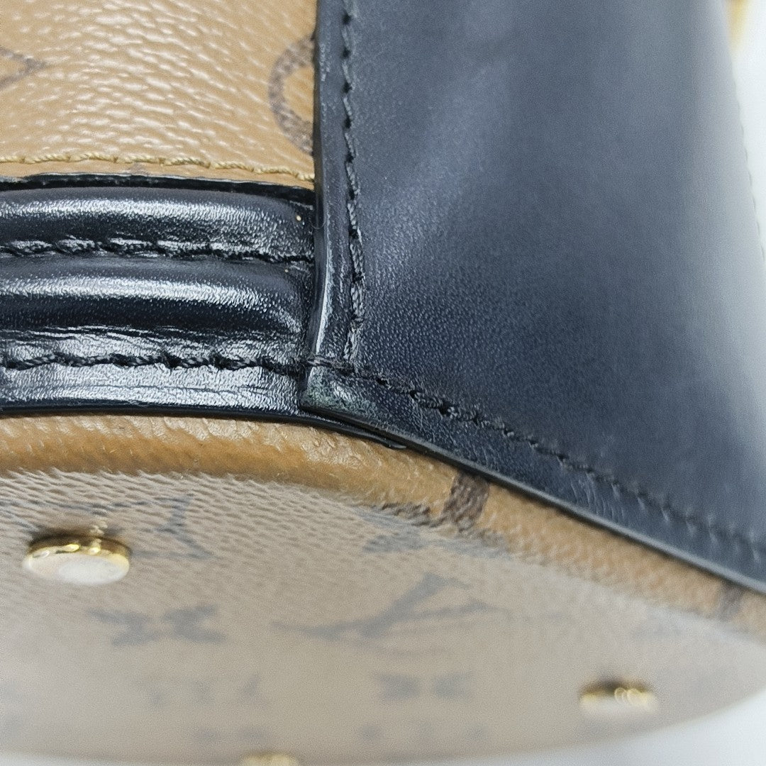 CANNES PM Monogram Coated Canvas Brown