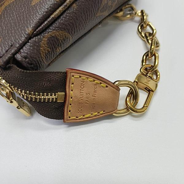 ACCESSOIRES GM Monogram Coated Canvas Brown