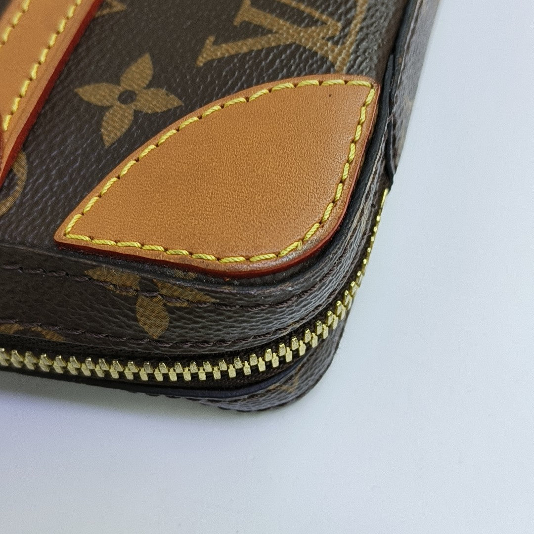 SOFT TRUNK PM Monogram Coated Canvas Brown