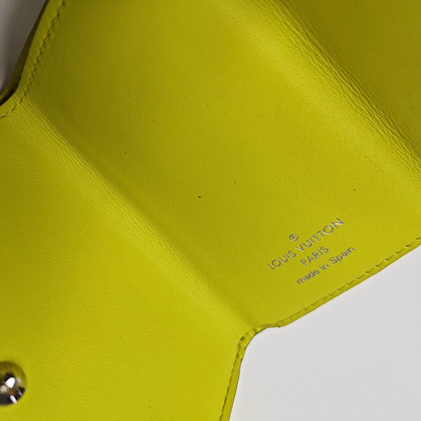 DISCOVERY Monogram Coated Canvas Yellow Card Holder