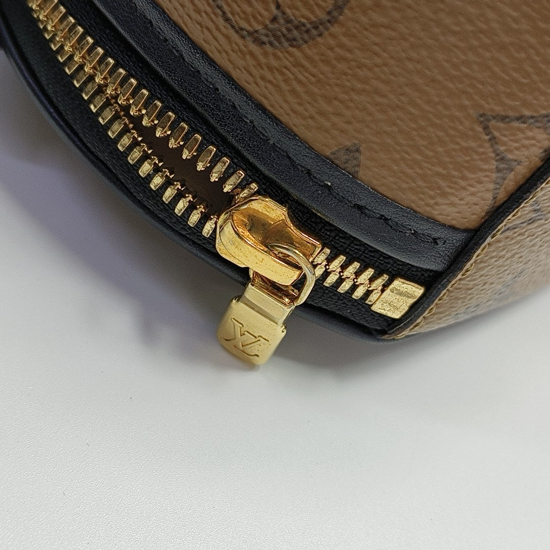 BOITE CHAPEAU Mini Monogram Coated Canvas Brown