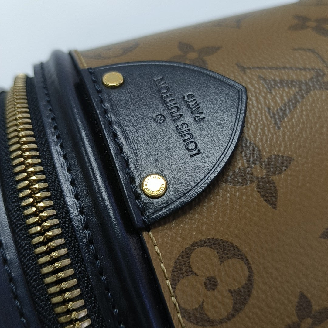 CANNES PM Monogram Coated Canvas Brown