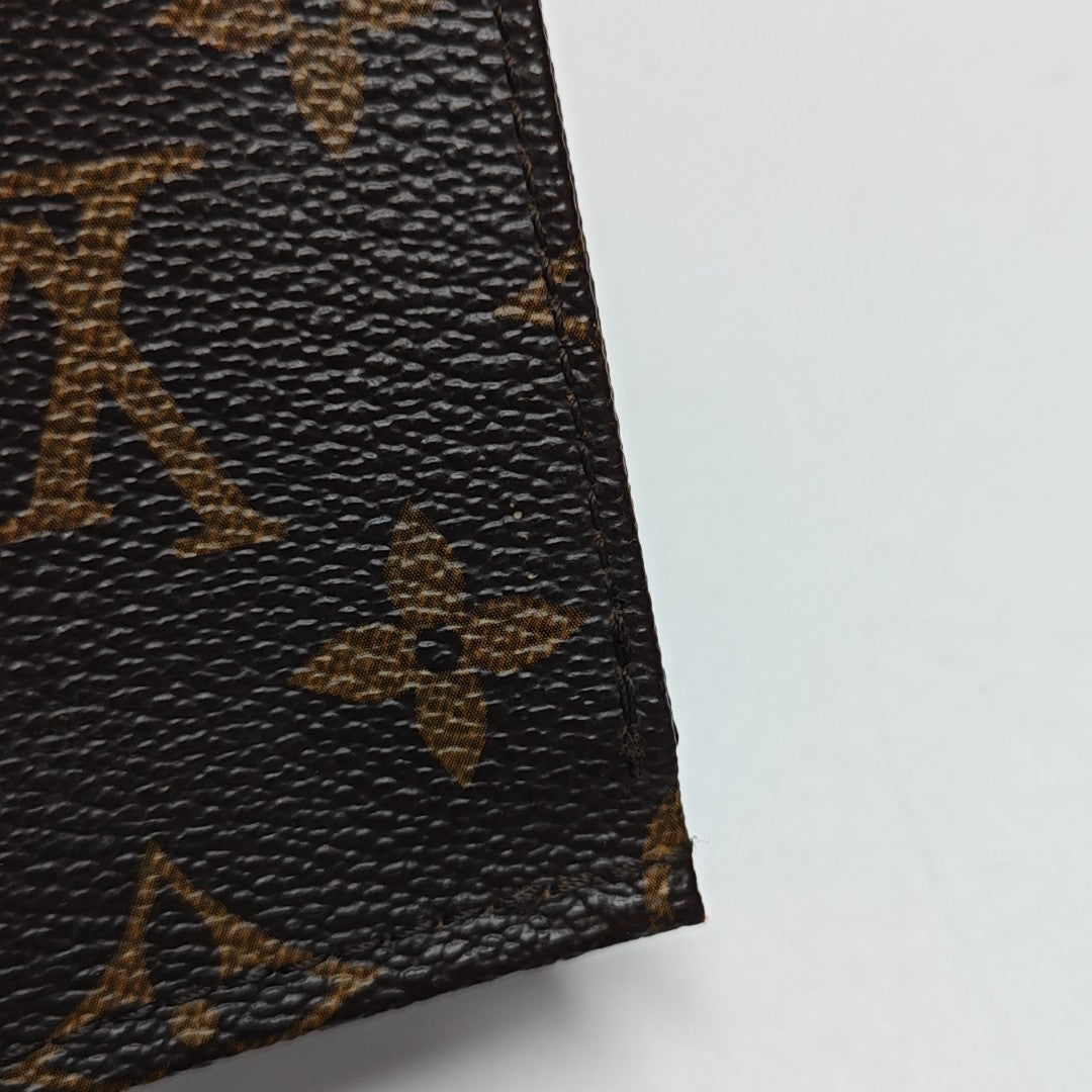 TOILET POCKET 15 Monogram Coated Canvas Brown