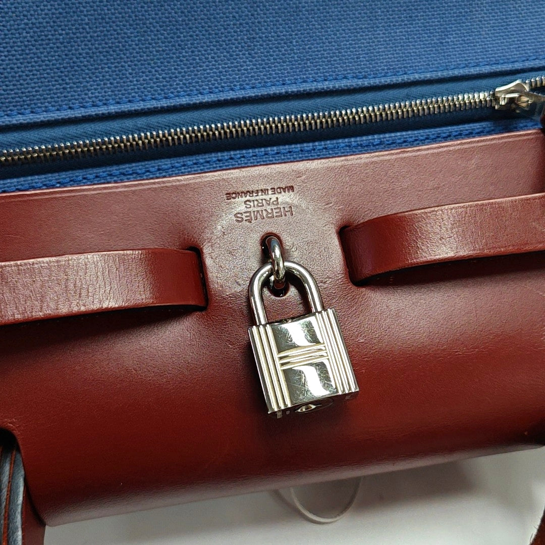 Authenticated pre-owned  Herbag 31 Canvas Blue - Shoulder Bag at Looply
