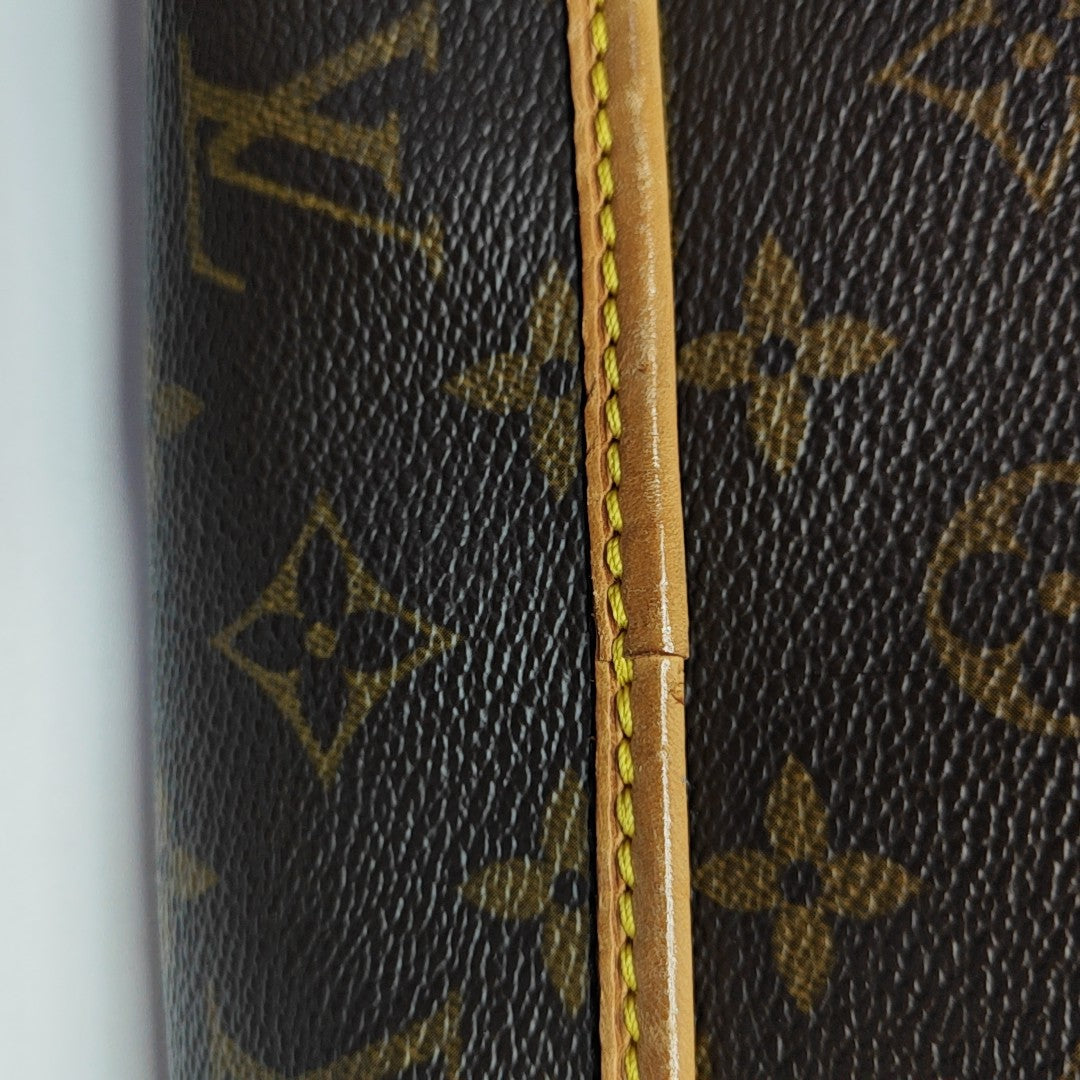 TIKAL Monogram Coated Canvas Brown