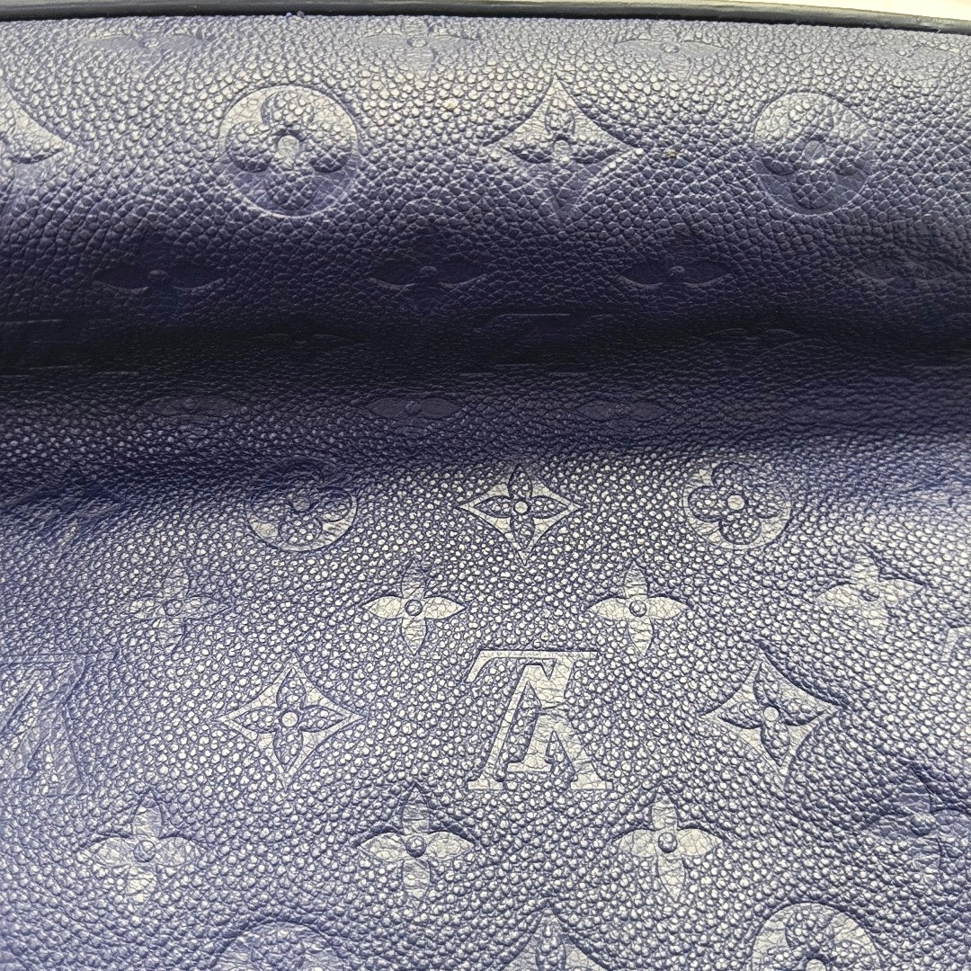 Authenticated pre-owned  MÉTIS Monogram Calfskin Blue - Bucket Bag at Looply