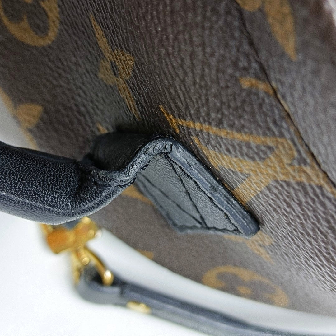Authenticated pre-owned  PALM SPRINGS Mini Monogram Coated Canvas Brown - Backpack at Looply