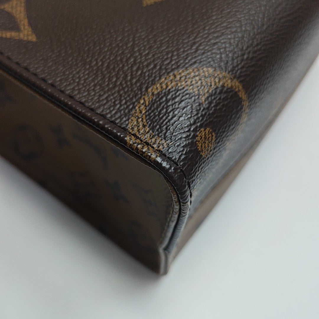 ONTHEGO PM Monogram Coated Canvas Brown