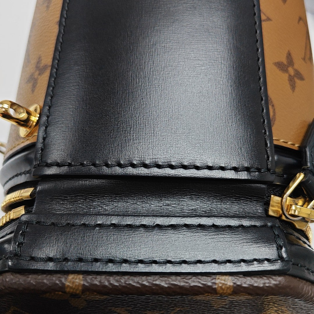 CANNES PM Monogram Coated Canvas Brown