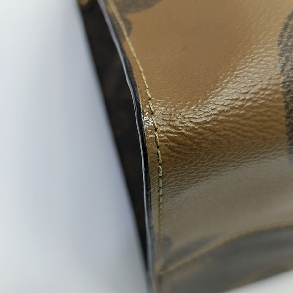 ONTHEGO GM Monogram Coated Canvas Brown
