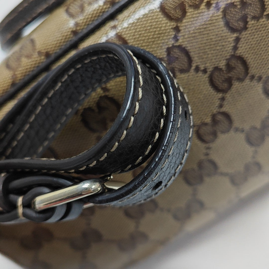 Dome Monogram Coated Canvas Brown