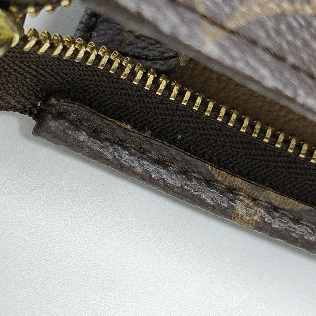 TOILET POCKET 19 Monogram Coated Canvas Brown