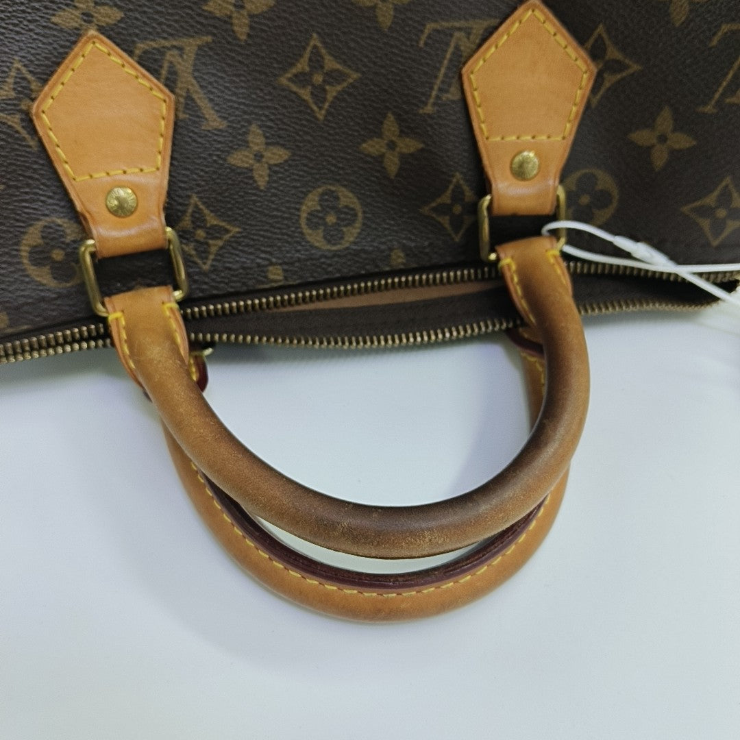SPEEDY 30 Monogram Coated Canvas Brown