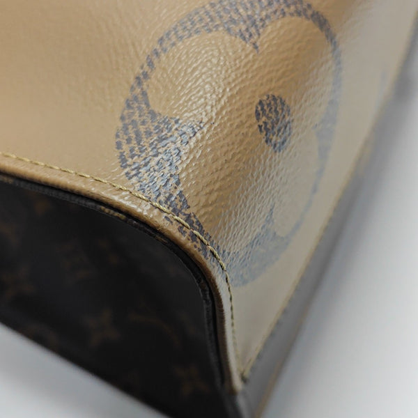ONTHEGO MM Monogram Coated Canvas Brown