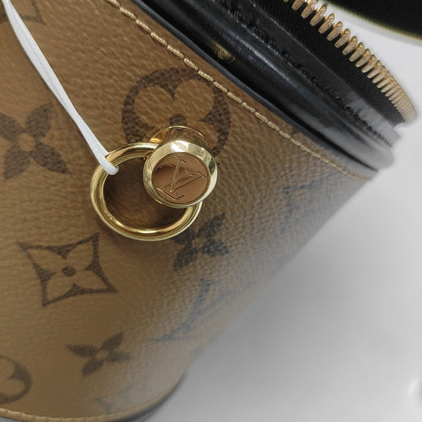 CANNES PM Monogram Coated Canvas Brown