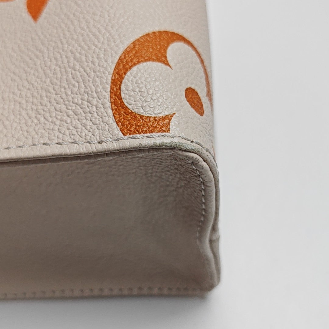 ONTHEGO PM Monogram Calfskin Beige