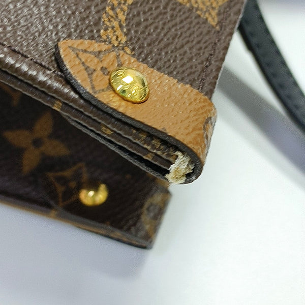 ONTHEGO MM Monogram Coated Canvas Brown