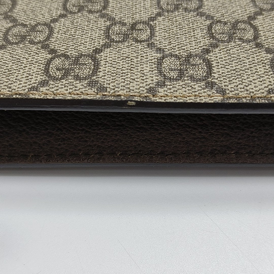Monogram Coated Canvas Clutch Beige